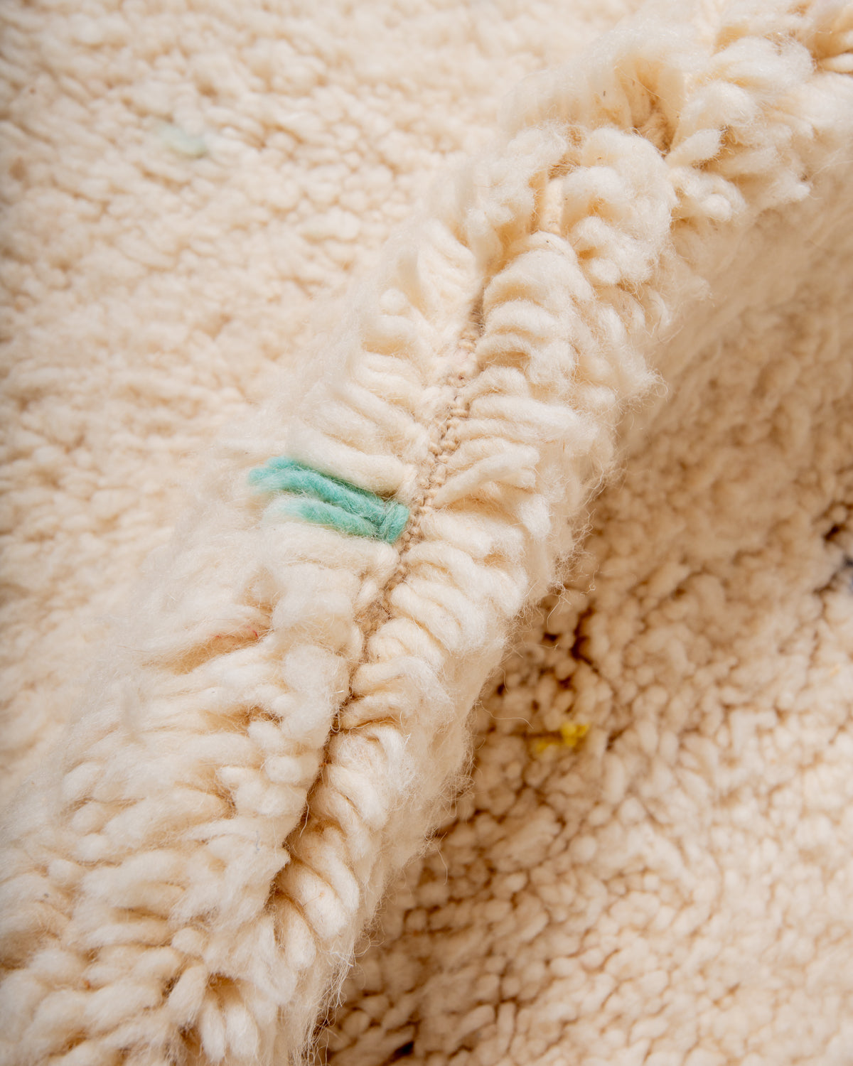 Modern, designer, handcrafted Berber rug from Morocco. Beniourain carpet with beautiful colours and patterns and fluffy wool texture.